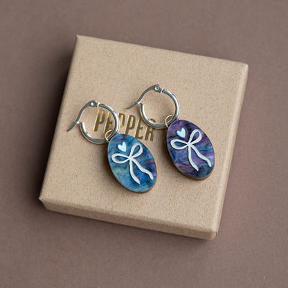 Oval Bow Charm Hoop Earrings