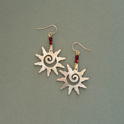 Brass Swirl Sol Earrings with Red Beads